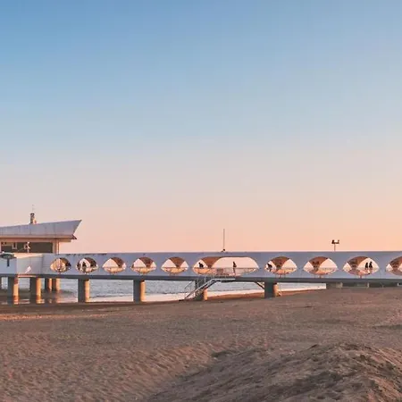 Two-level Flat For Groups In Lignano *